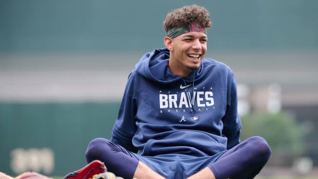Aug 26, 2023; San Francisco, California, USA; Atlanta Braves infielder Vaughn Grissom (18) sits on the field and laughs during warmups before the game against the San Francisco Giants at Oracle Park.